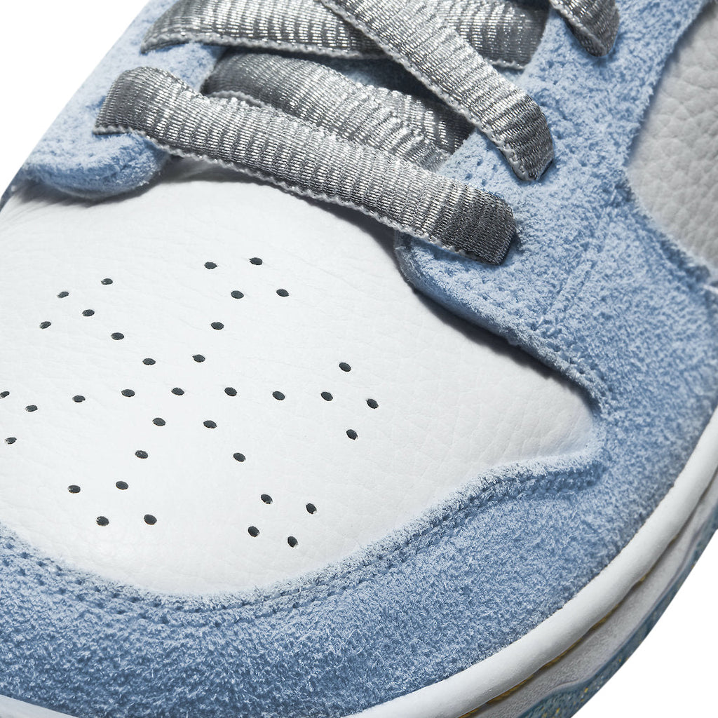 Sean Cliver X Nike SB Dunk Low Holiday Special DC9936-100